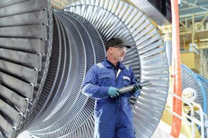 Fig2-engineer-with-turbine-blade-maintenance