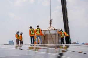 Fig3-service-engineer-installing-solar-cell-on-the-roof